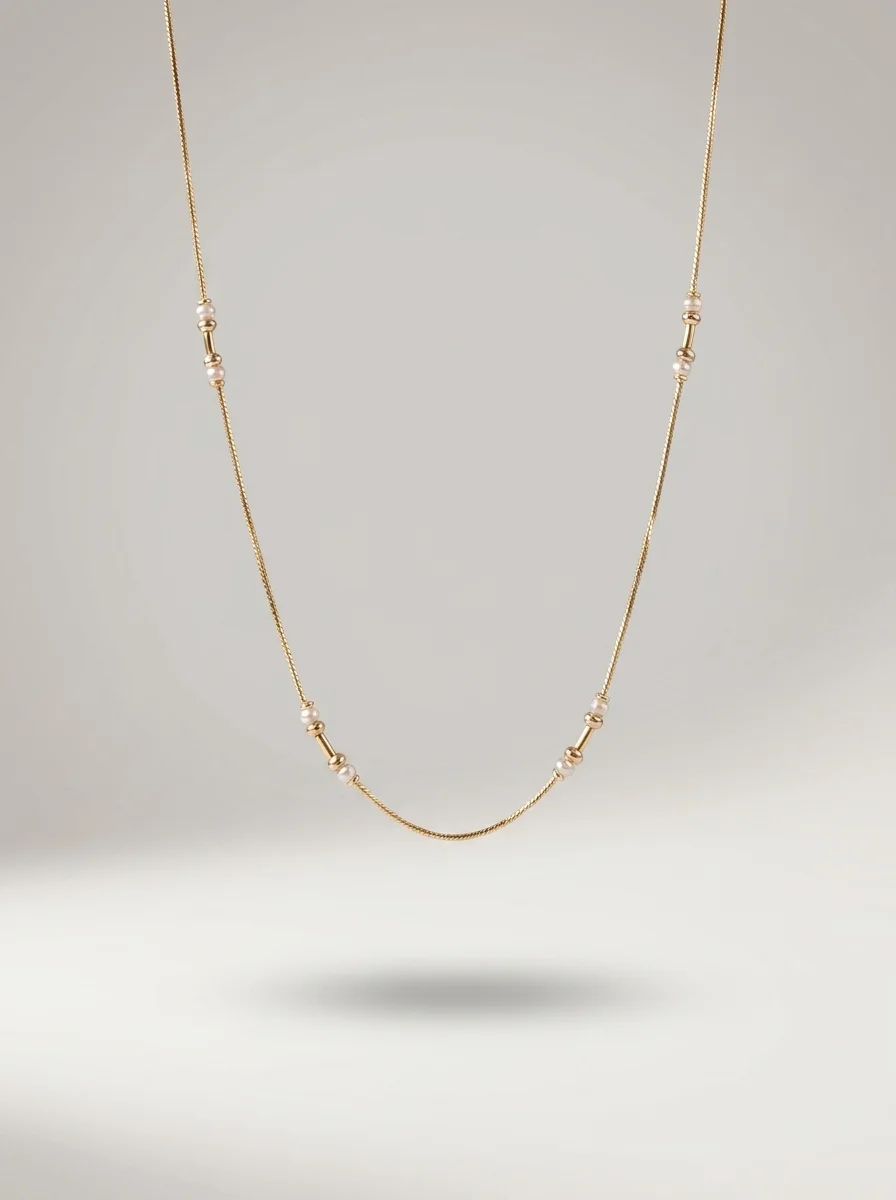 Elegant Gold Pearl Station Necklace