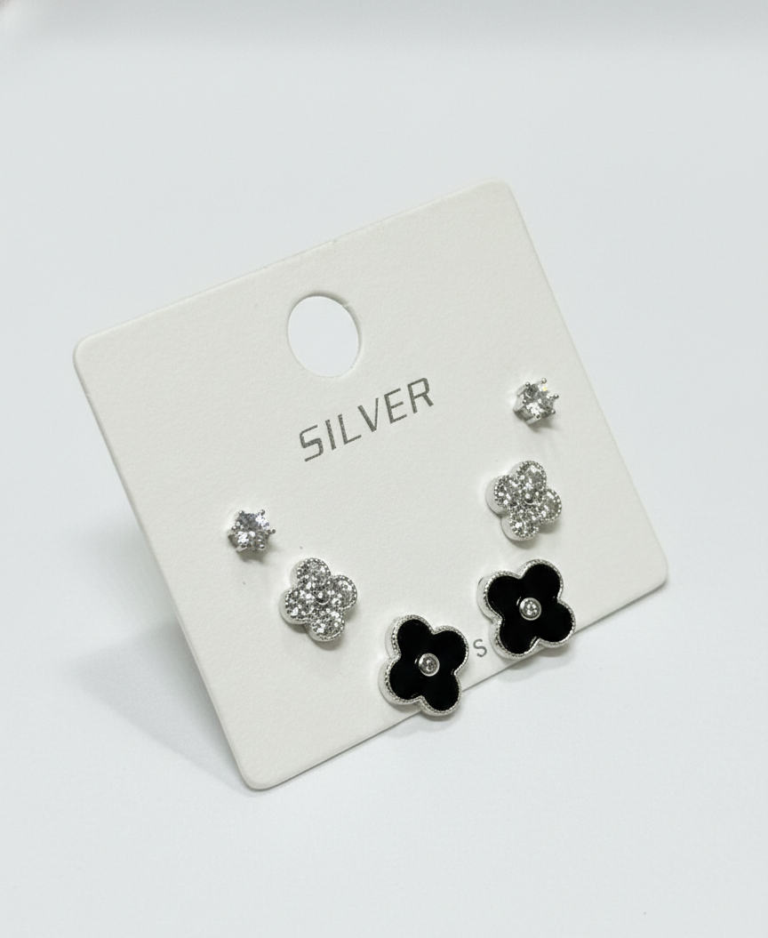 crystal solitaire, crystal pavé flower, and black enamel flower silver stud earrings